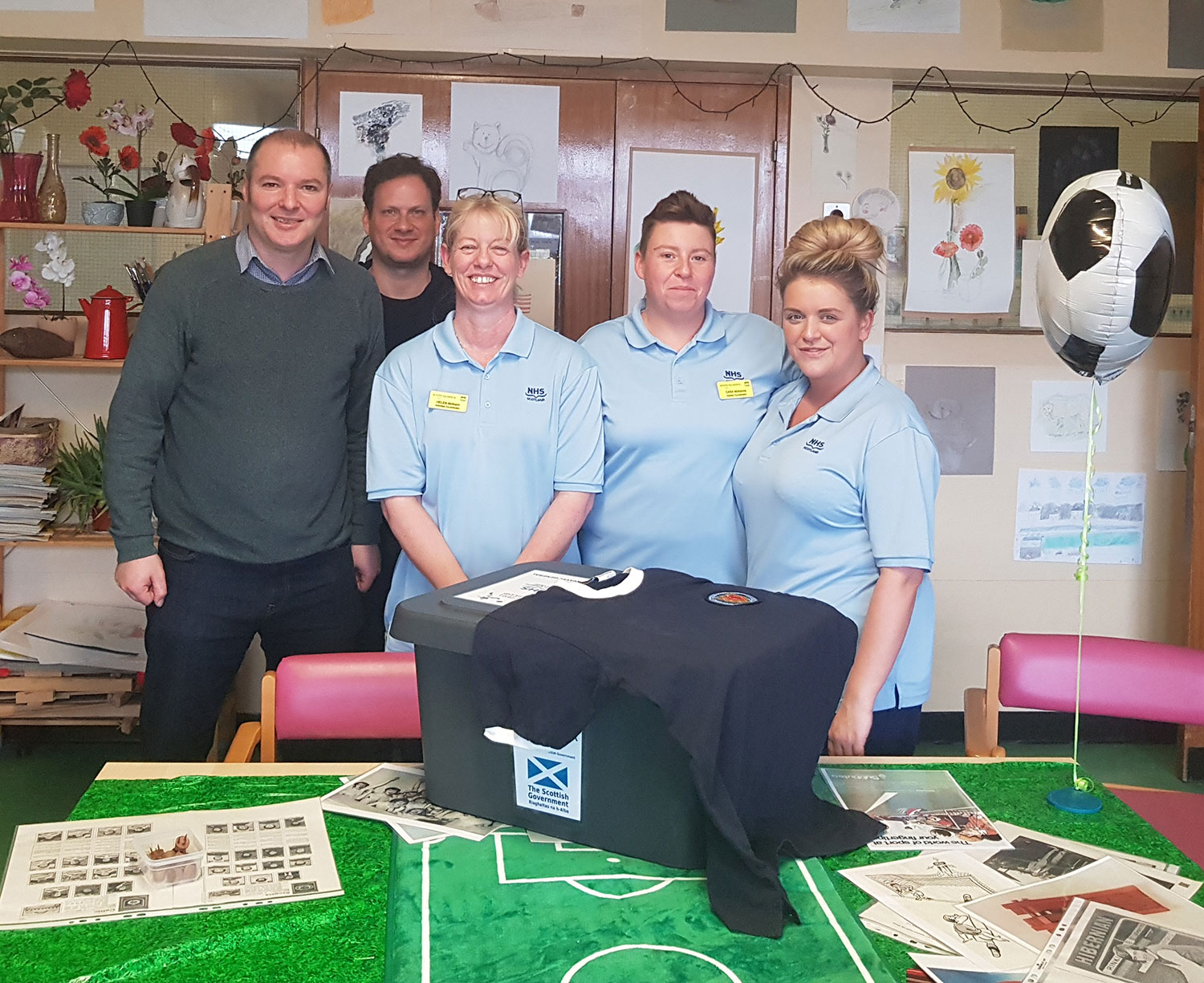 Care Provider Organisation – Staff pictured at NHS Gartnavel Royal ahead of a Football Memories session